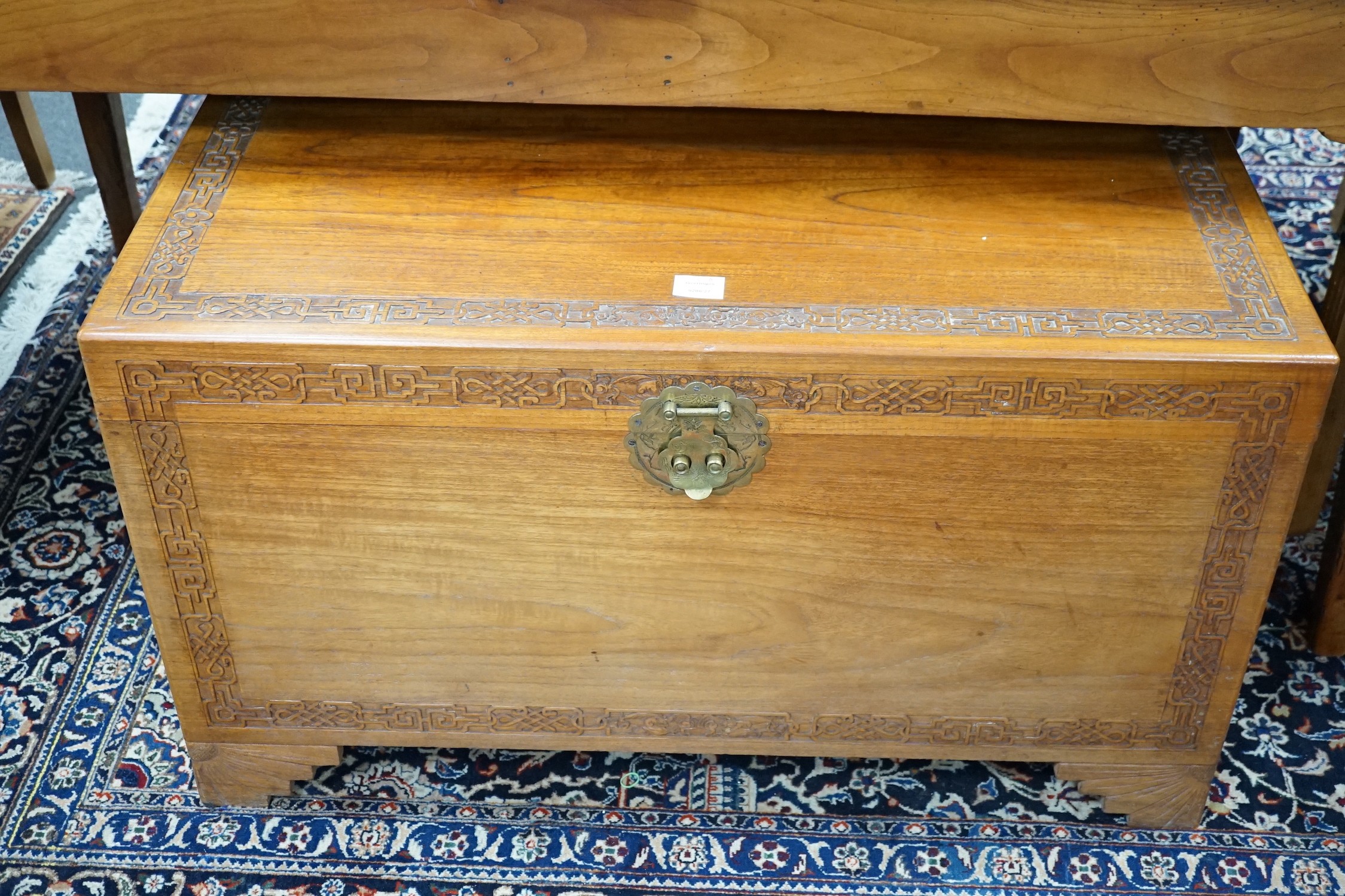 A Chinese carved camphorwood chest, width 97cm *Please note the sale commences at 9am.